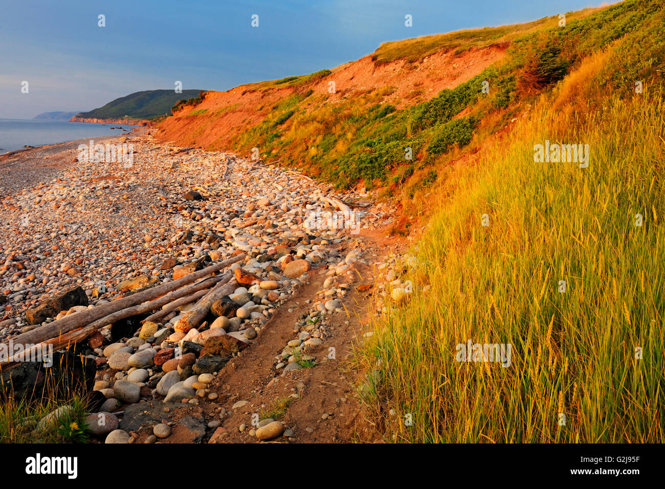 Red cliffs at sunset on Cabot Trail Pleasant Bay Nova Scotia Canada