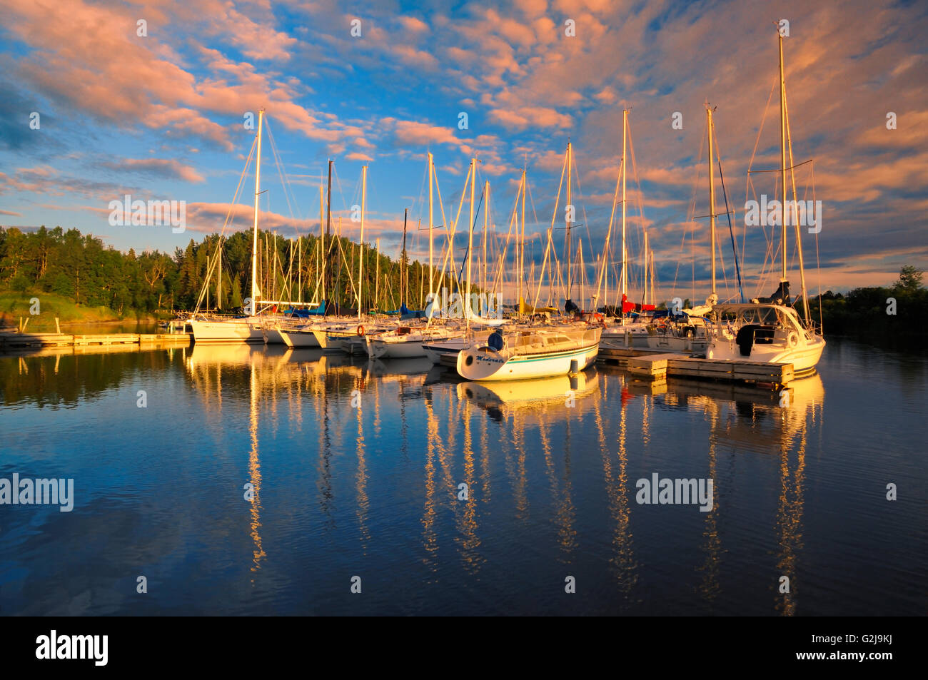 Sailboats at sunset Parc national de la Pointe-Taillon Quebec Canada Stock Photo