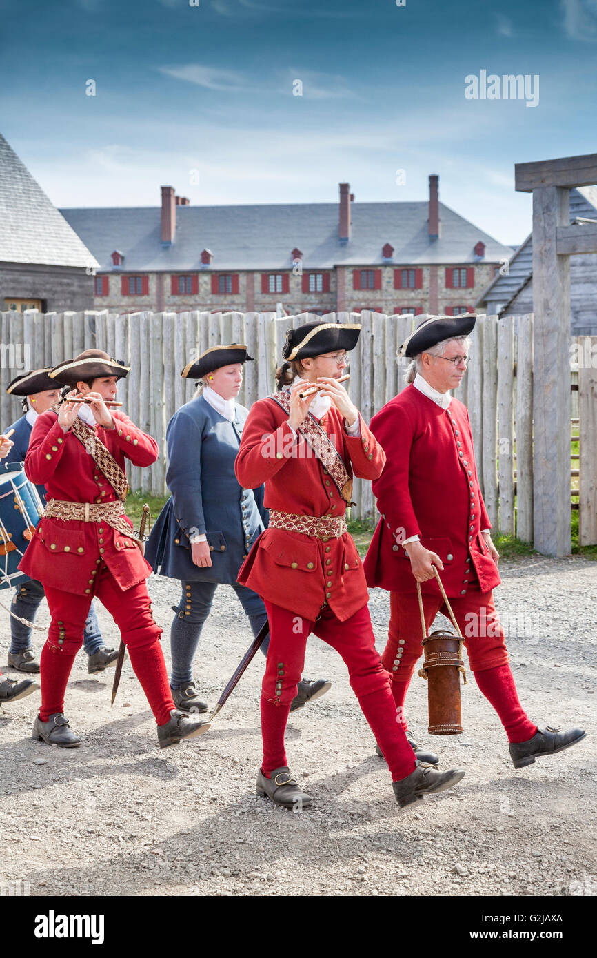 Musical procession signalling firing of cannon Fortress of Louisbourg National Historic Site of Canada in Louisbourg Nova Scotia Stock Photo
