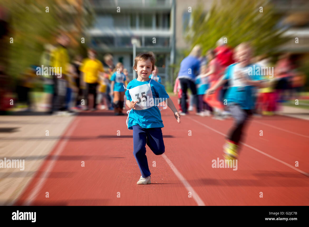 Young preschool children, running on 