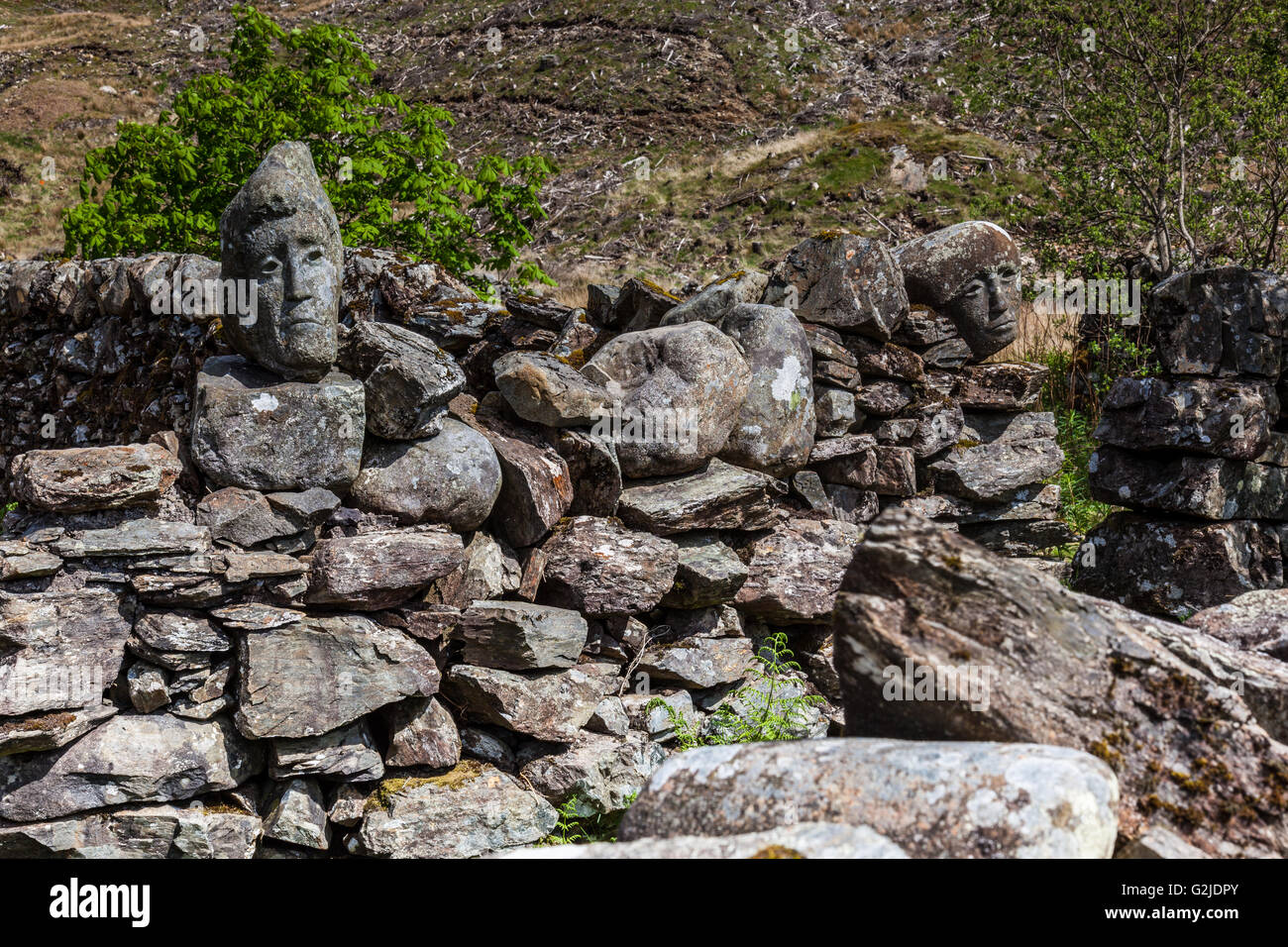Carved stone face on wall hi-res stock photography and images - Alamy