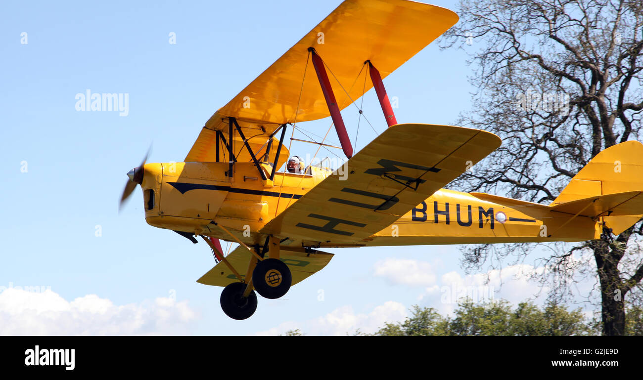 a yellow Tiger Moth aircraft at an airfield in Yorkshire, UK Stock Photo