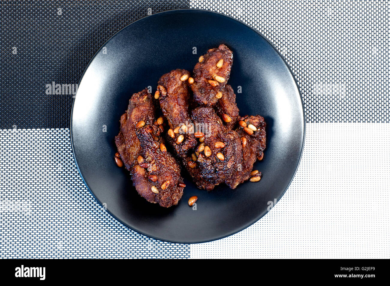 Korean glazed chicken wings over wooden background from top Stock Photo Alamy