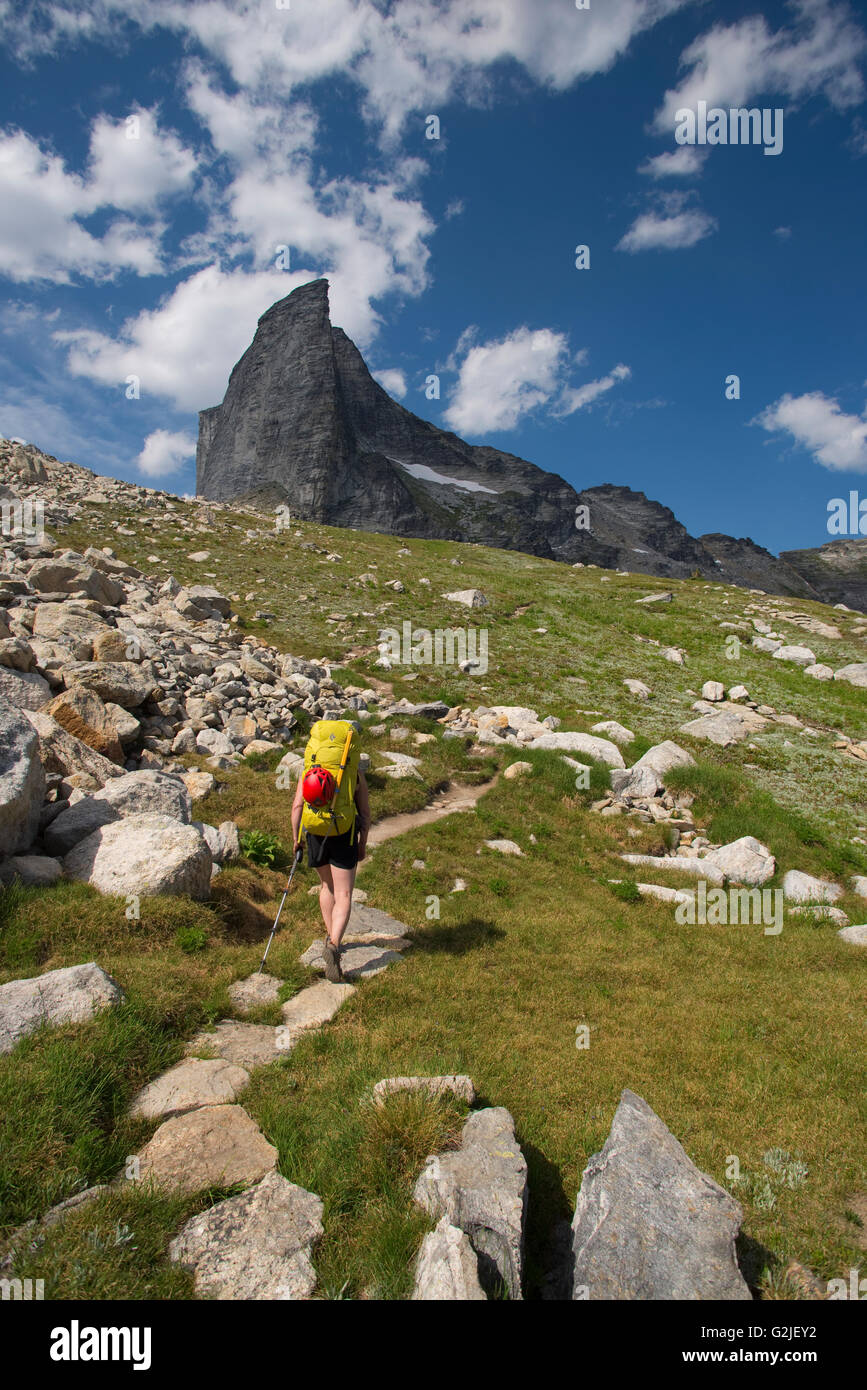 Hiker approaching Mount Gimli, Selkirk Mountains. Valhalla Provincial Park, British Columbia, Canada Stock Photo