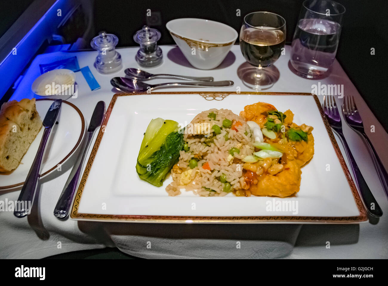 Indian food in the business class cabin on Jet Airways flight Stock Photo