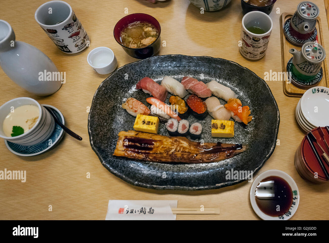 Japanese sushi meal in a restaurant at Tsukiji market in Tokyo Stock