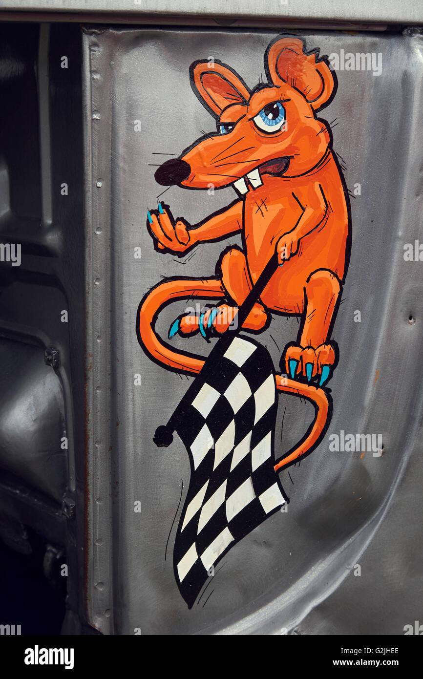 painted rat with chequered flag on a car Stock Photo