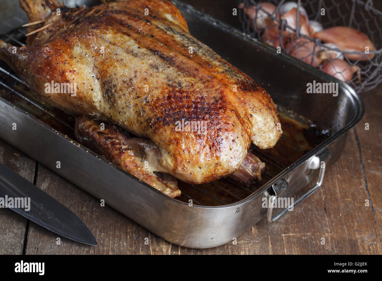 Crispy roasted Barbery Duck in in roasting pan ready for serving Stock
