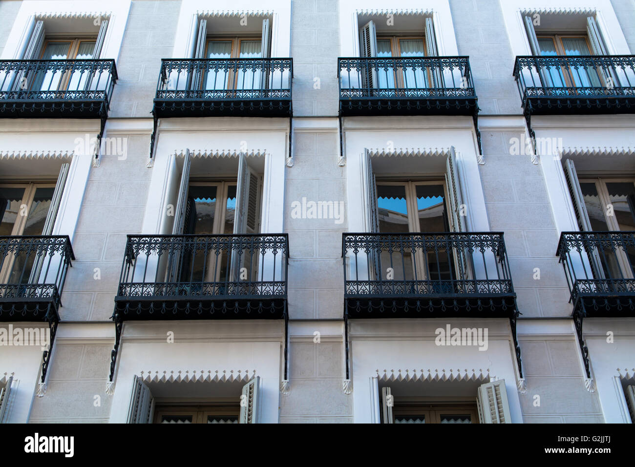 Building Facade Windows with Balconies in Downtown City Stock Photo - Alamy