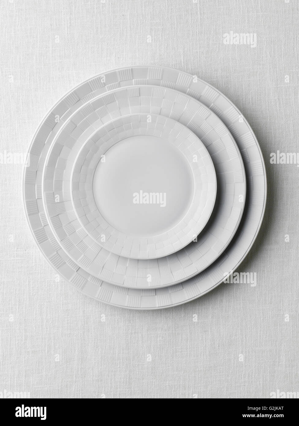 Three White Plates of Different Size Stock Photo Alamy