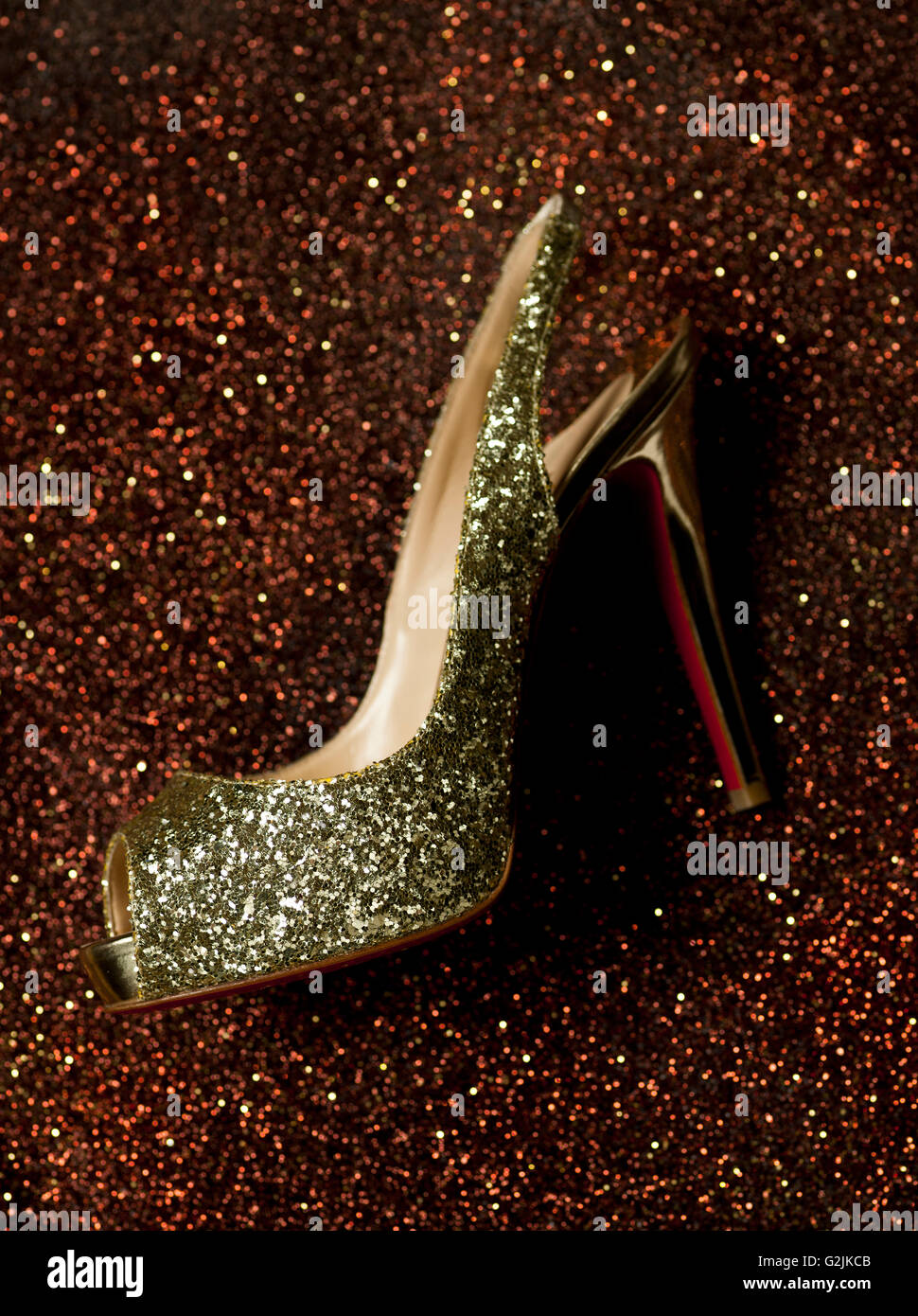 Sparkling Gold Shoe Stock Photo - Alamy