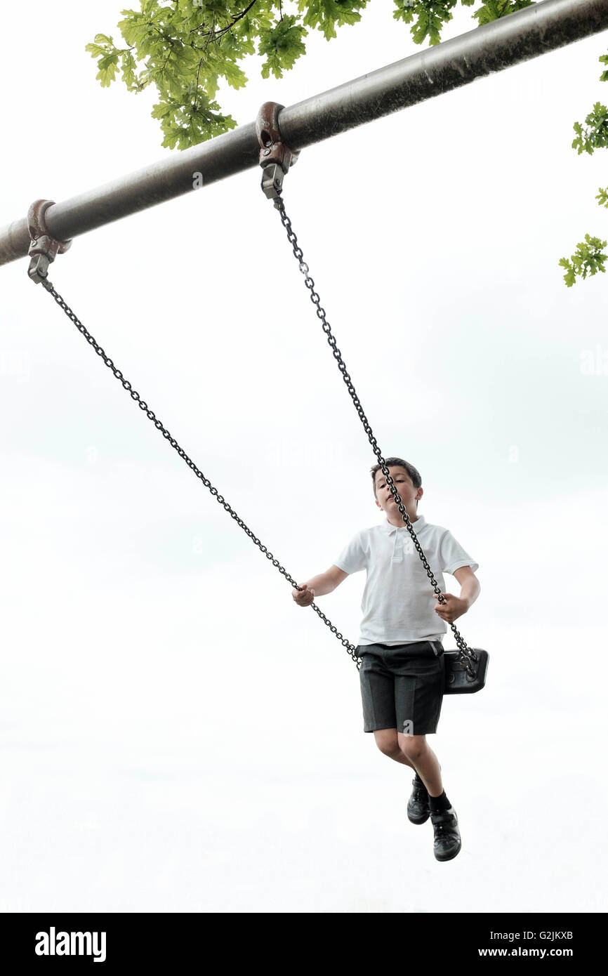 Boy on a swing Stock Photo