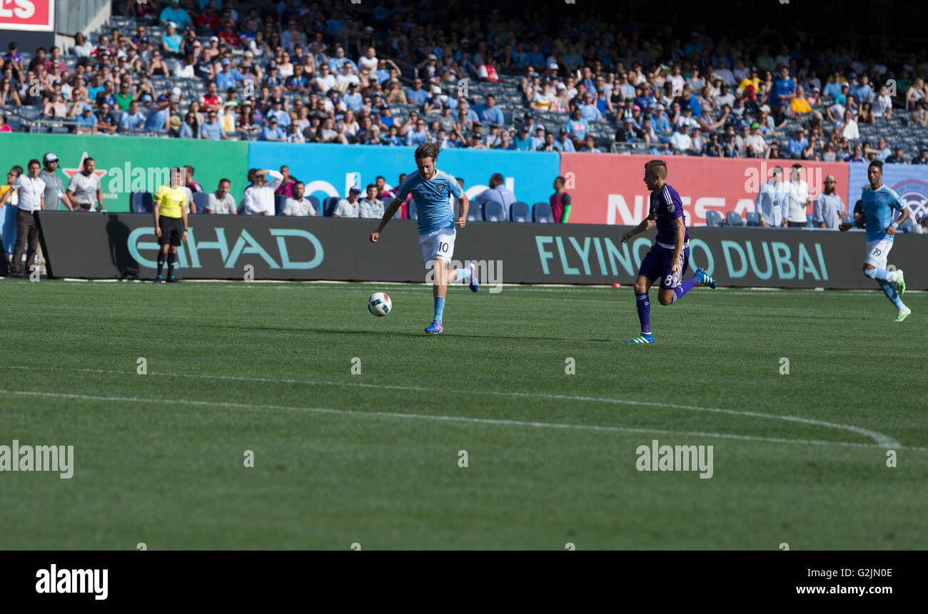 New York, NY USA - May 29, 2016: Mix Diskerud (10) of NYC FC controls ball during MLS match against Orlando City SC on Yankee stadium Stock Photo