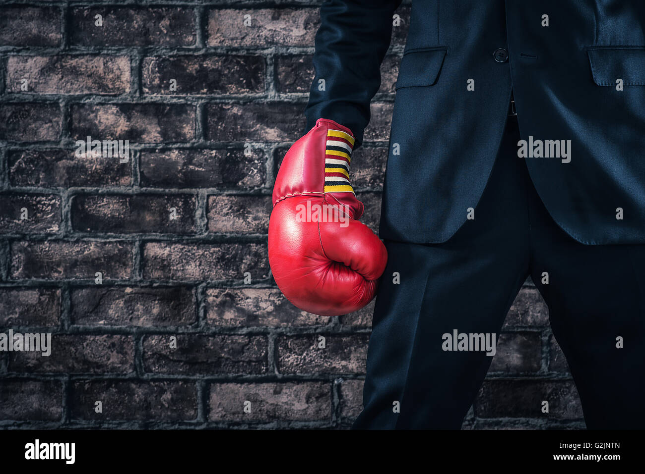 Boxing gloves,Man wearing a suit Stock Photo