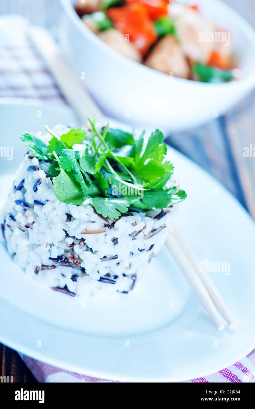 boiled rice on plate and on a table Stock Photo - Alamy