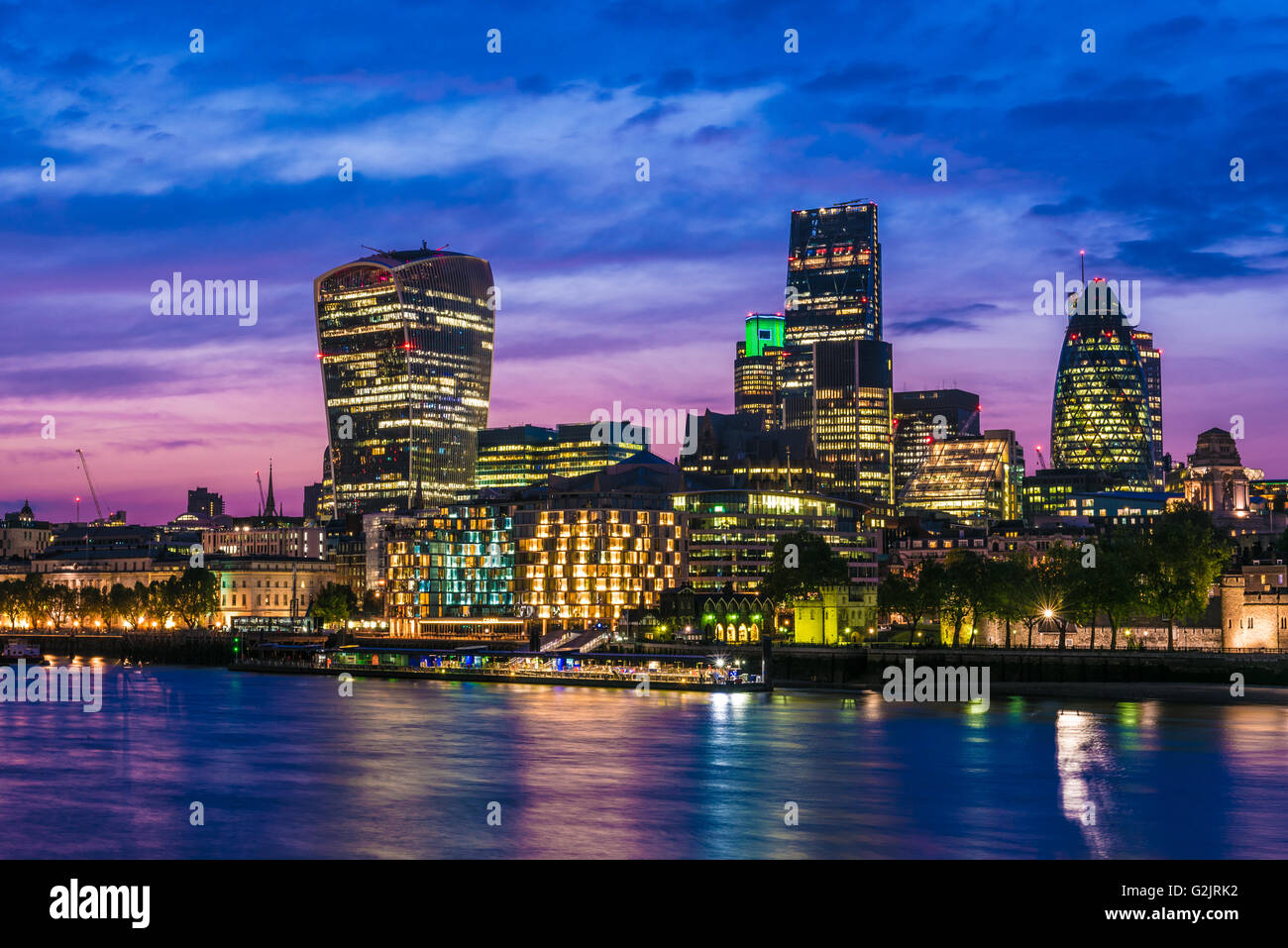 Skyline of the City of London and River Thames in England with iconic high-rise buildings Stock Photo