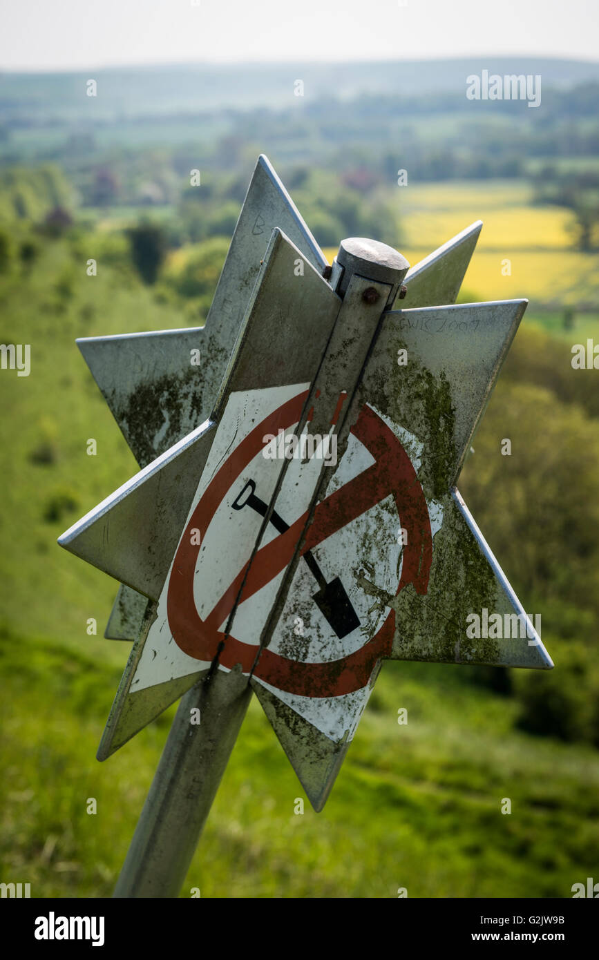 Archaeological 'No Digging' star sign on Scratchbury Iron Age Hill Fort near Warminster, Wiltshire, UK Stock Photo