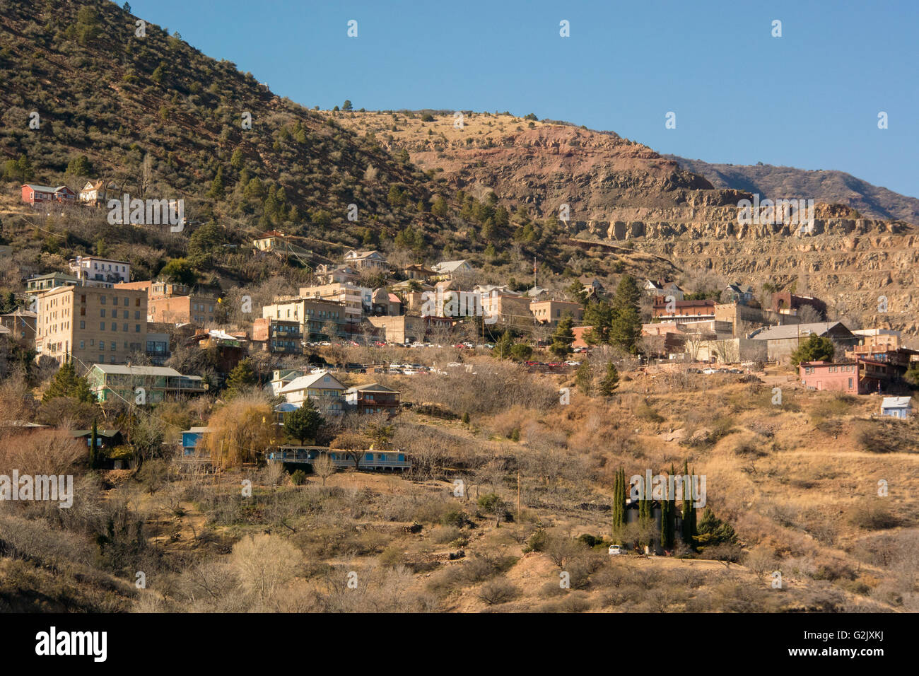 Jerome, AZ, historical copper mining town, mining tailings on right Stock Photo