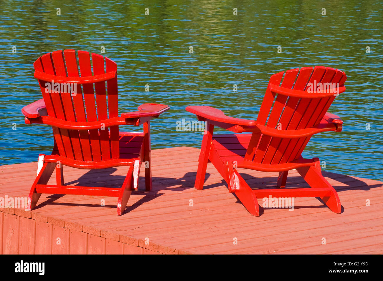 Muskoka chairs on dock, Lake of the Woods, Northwestern Ontario, Canada