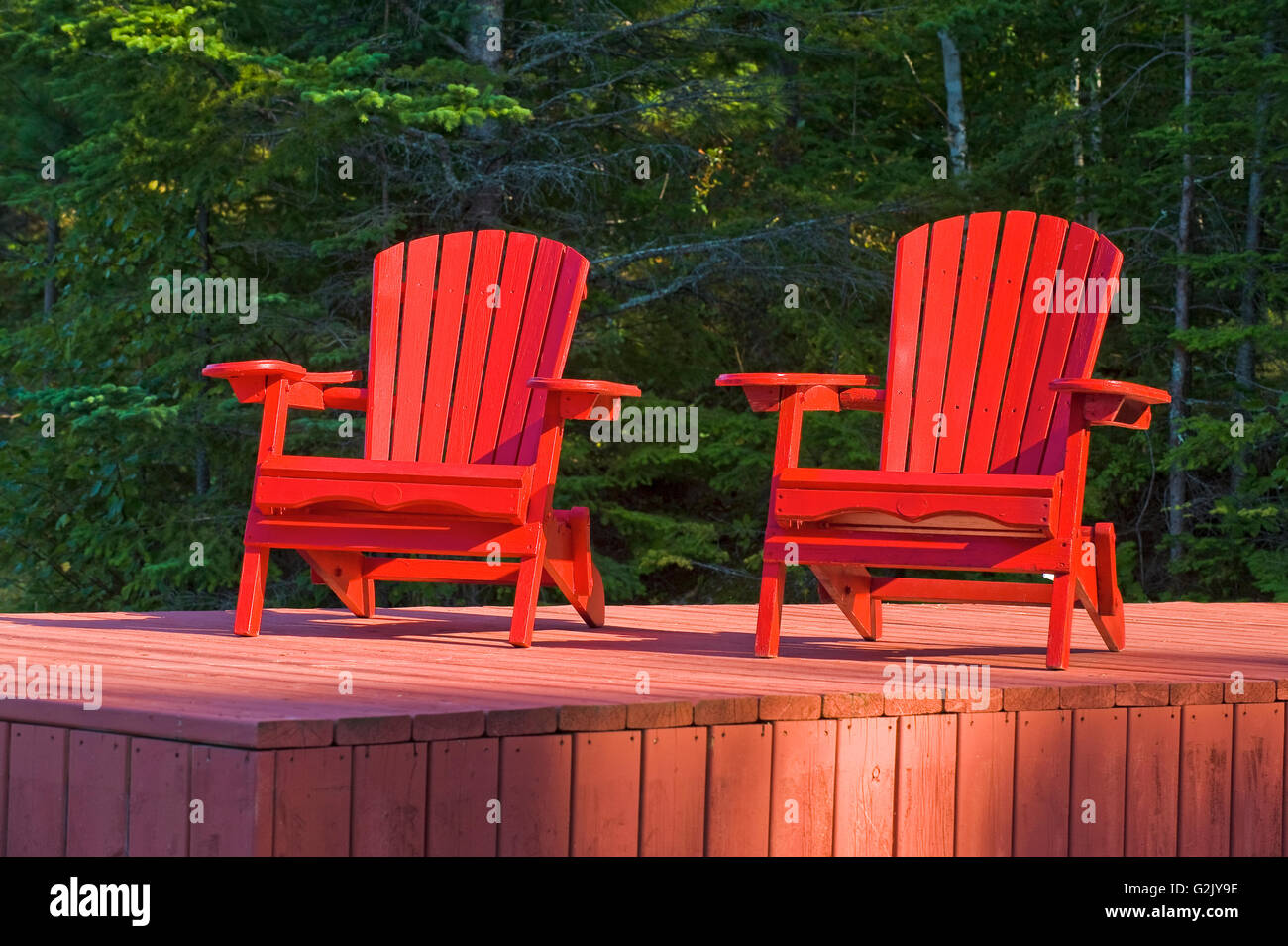 Muskoka chairs on dock, Lake of the Woods, Northwestern Ontario, Canada