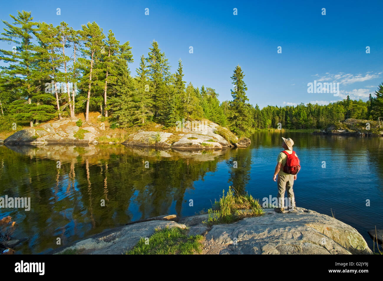 hiker, Lake of the Woods, Northwestern Ontario, Canada Stock Photo