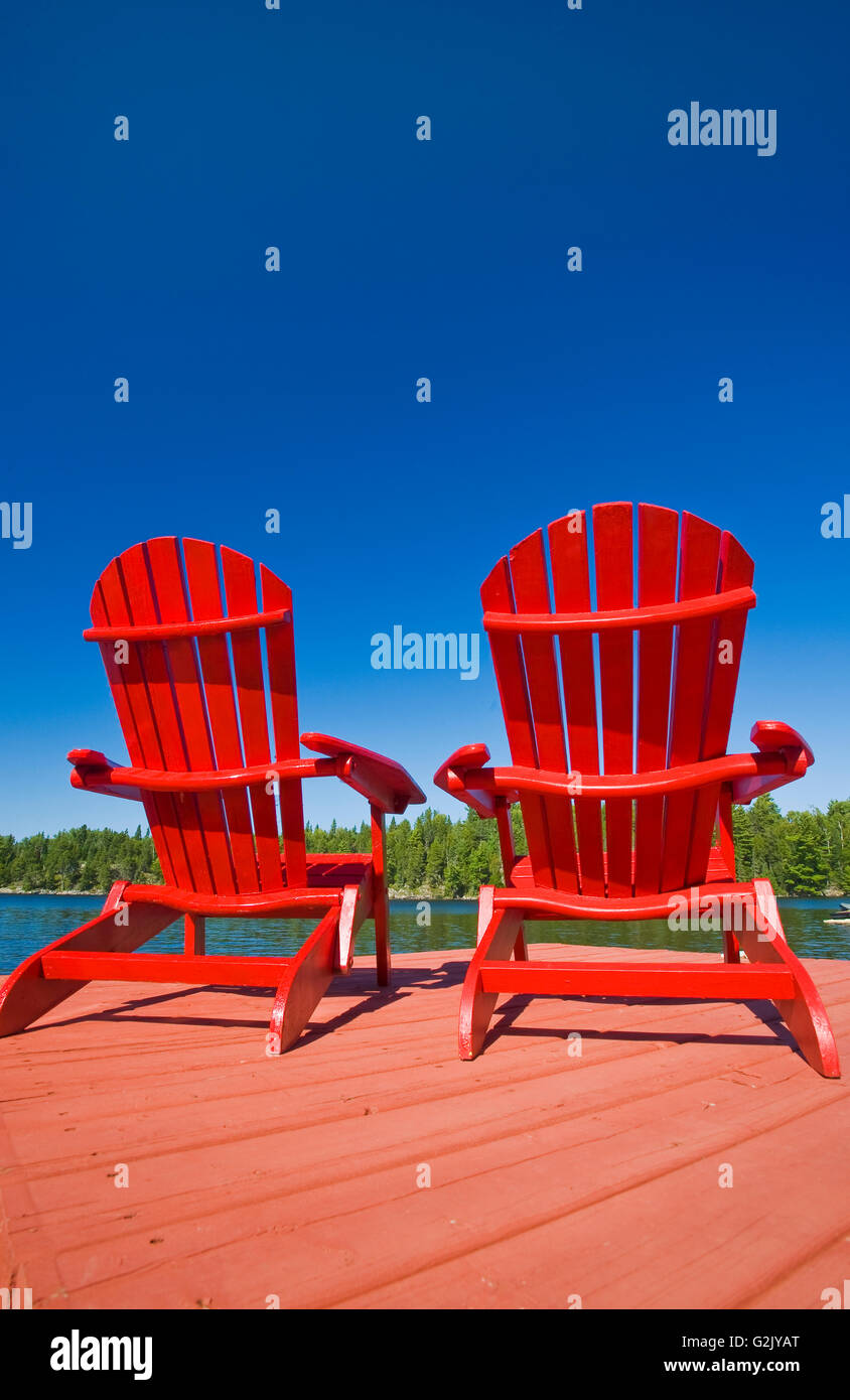 Muskoka chairs on dock, Lake of the Woods, Northwestern Ontario, Canada