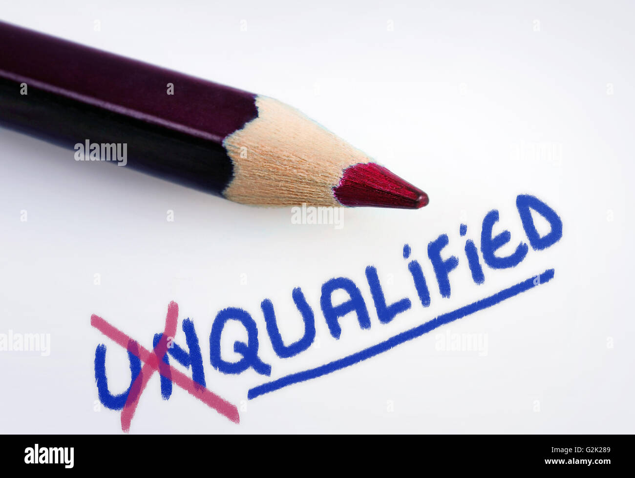 Unqualified word on grey background Stock Photo