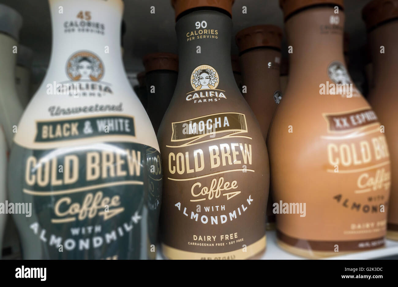 Bottles of Califia Farms brand ready-to-drink coffee with almond milk in a supermarket in New York on Wednesday, May 25, 2016. Coffee makers are throwing their weight into canned and bottled coffee, both cold brew and traditional in hopes that consumers will pick up on the fad. Ready-to-drink coffee sales in the U.S. have grown in the double digits in the last five years. Nut milks have also grown in popularity in the last few years. (© Richard B. Levine) Stock Photo