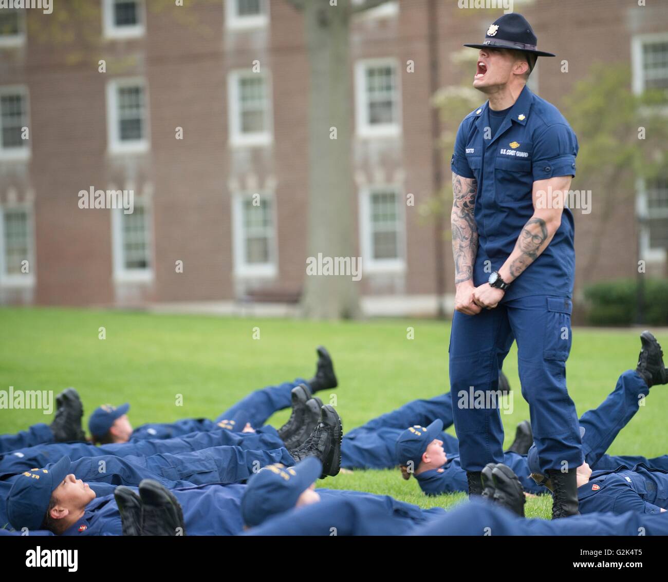 U.S. Coast Guard participate in a week-long training course with Cape May Recruit Company Commanders during 100th Week at the U.S. Coast Guard Academy May 9, 2016 in New London, Connecticut. Stock Photo