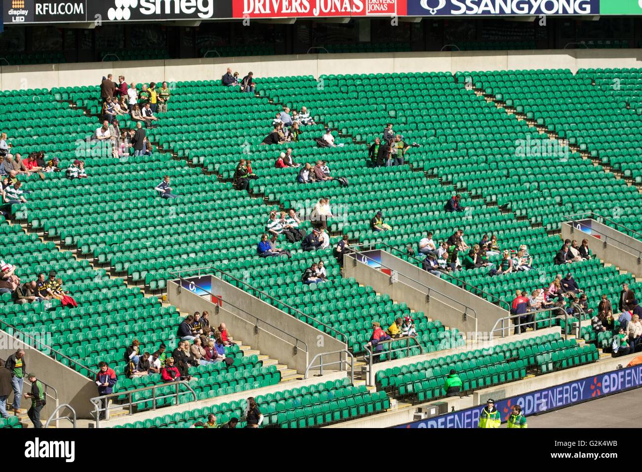 A quiet area of seating in a sports stadium Stock Photo