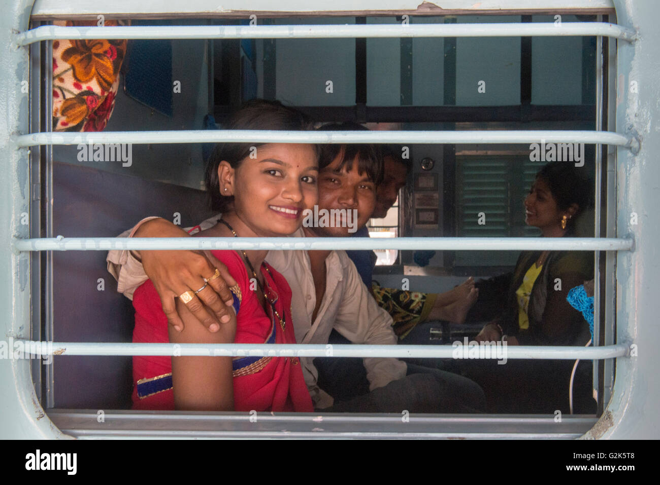 Couple Inside Indian Railways Sleeper Class Carriage, Train Station, Ujjain Stock Photo