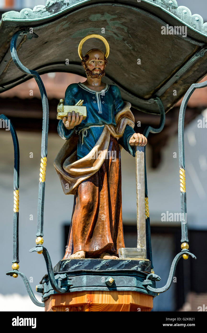 Carved wooden statue of Saint Joseph of Nazareth with plane and machinist square, patron saint of laborers Stock Photo