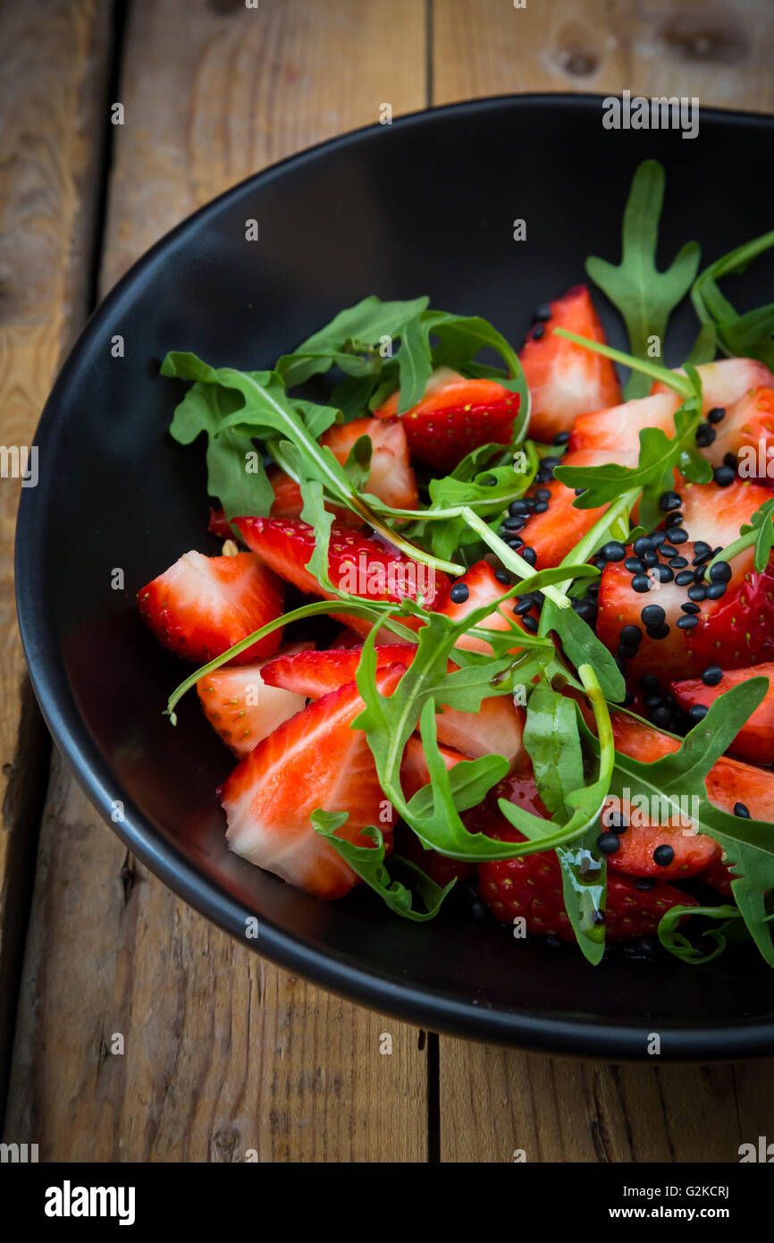 Strawberry rocket beluga lentil salad Stock Photo - Alamy