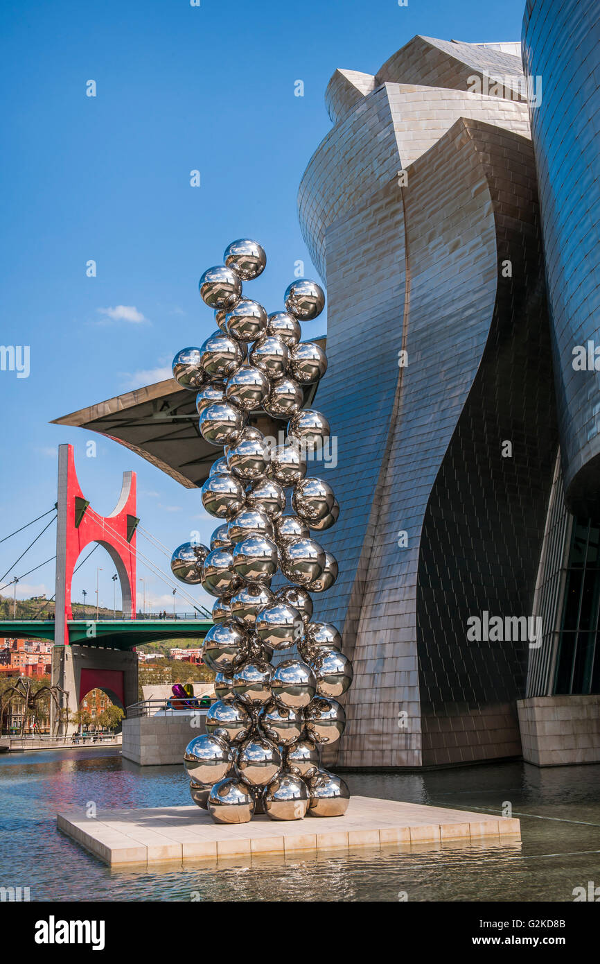 Artwork Tall Tree and the Eye by Anish Kapoor in front of Guggenheim Museum Bilbao, architect Frank O. Gehry, Bilbao Stock Photo