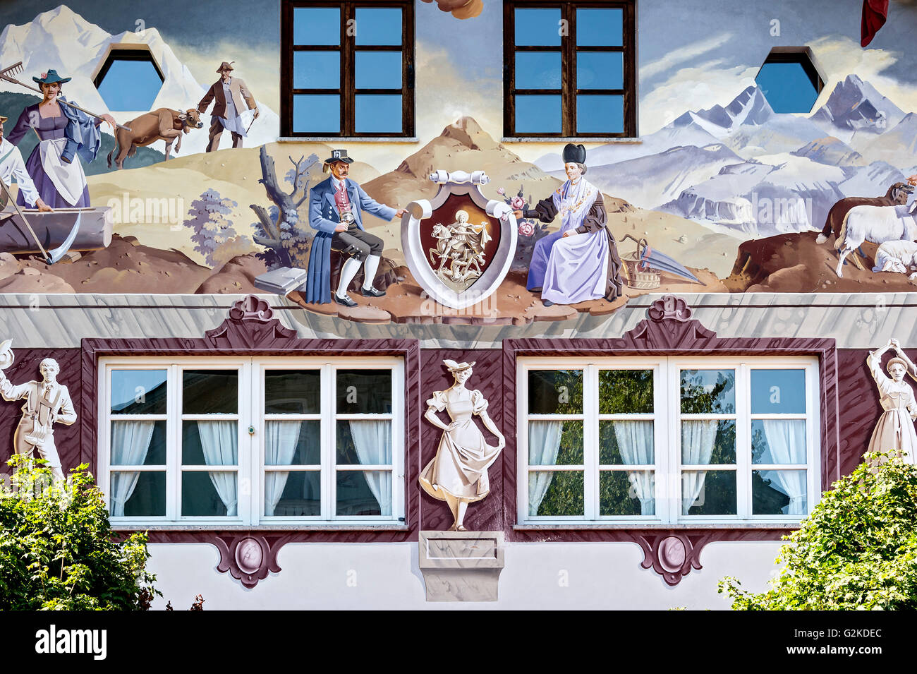 Bavarian mural painting on house facade, traditional costumes shop, Garmisch, Garmisch-Partenkirchen District, Werdenfelser Land Stock Photo