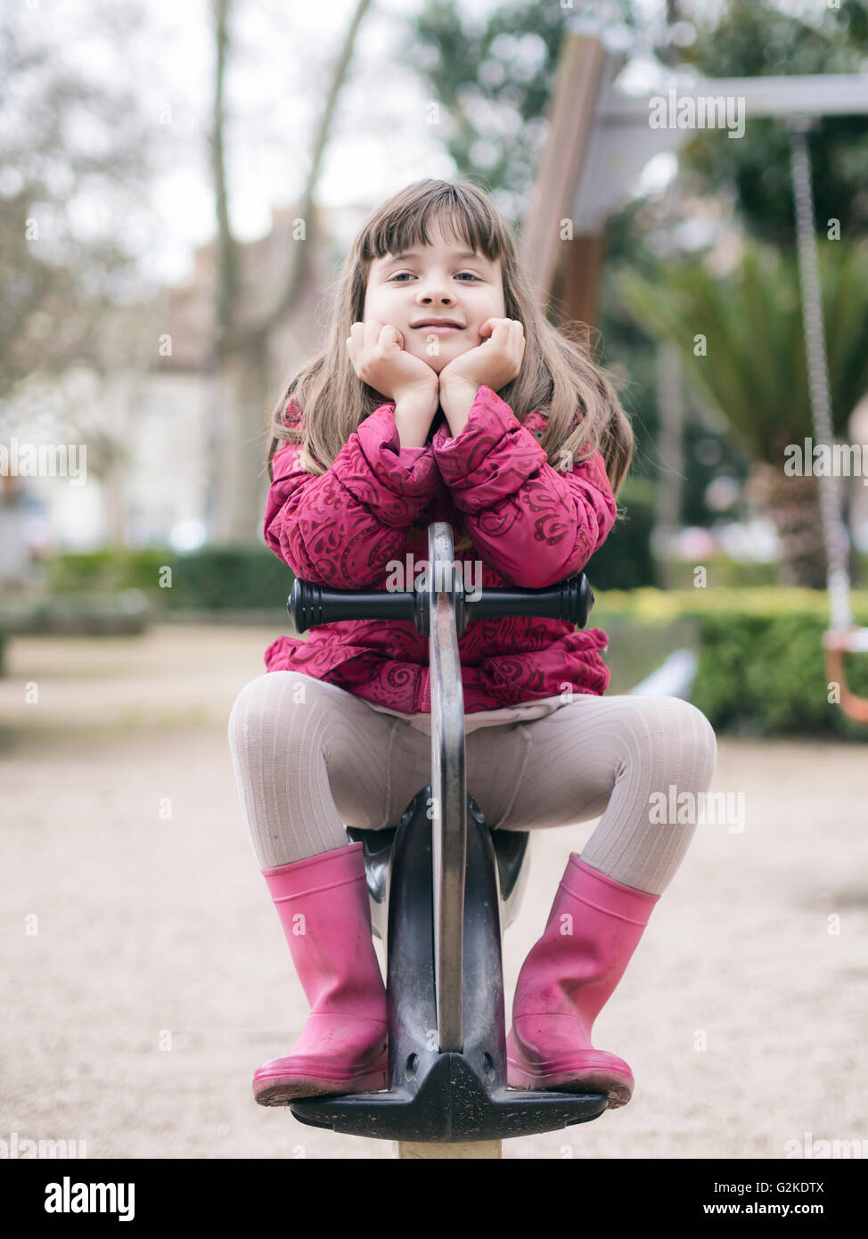 Portrait of girl on playground Stock Photo - Alamy