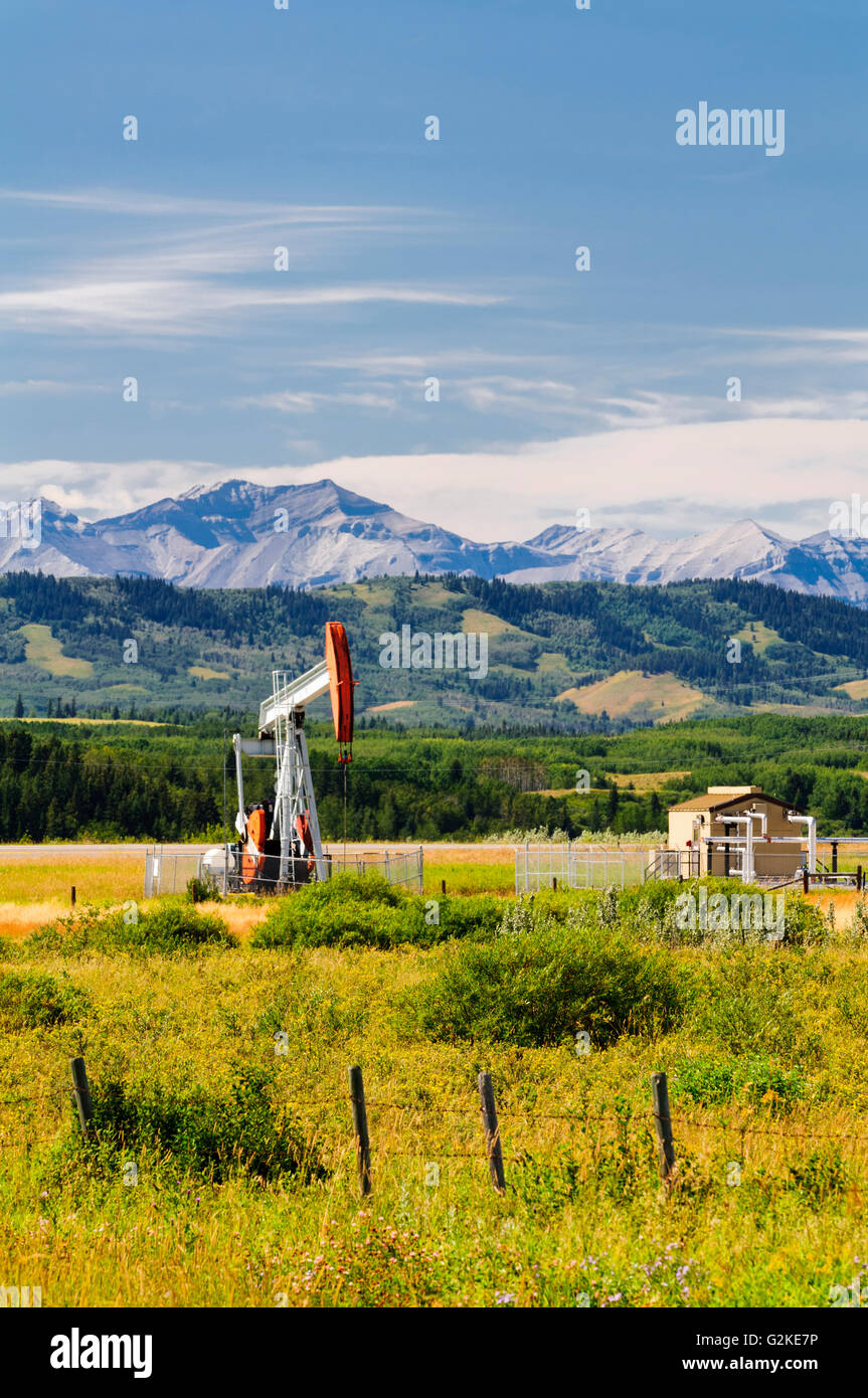 A small oil drilling rig near Longview, Alberta Stock Photo