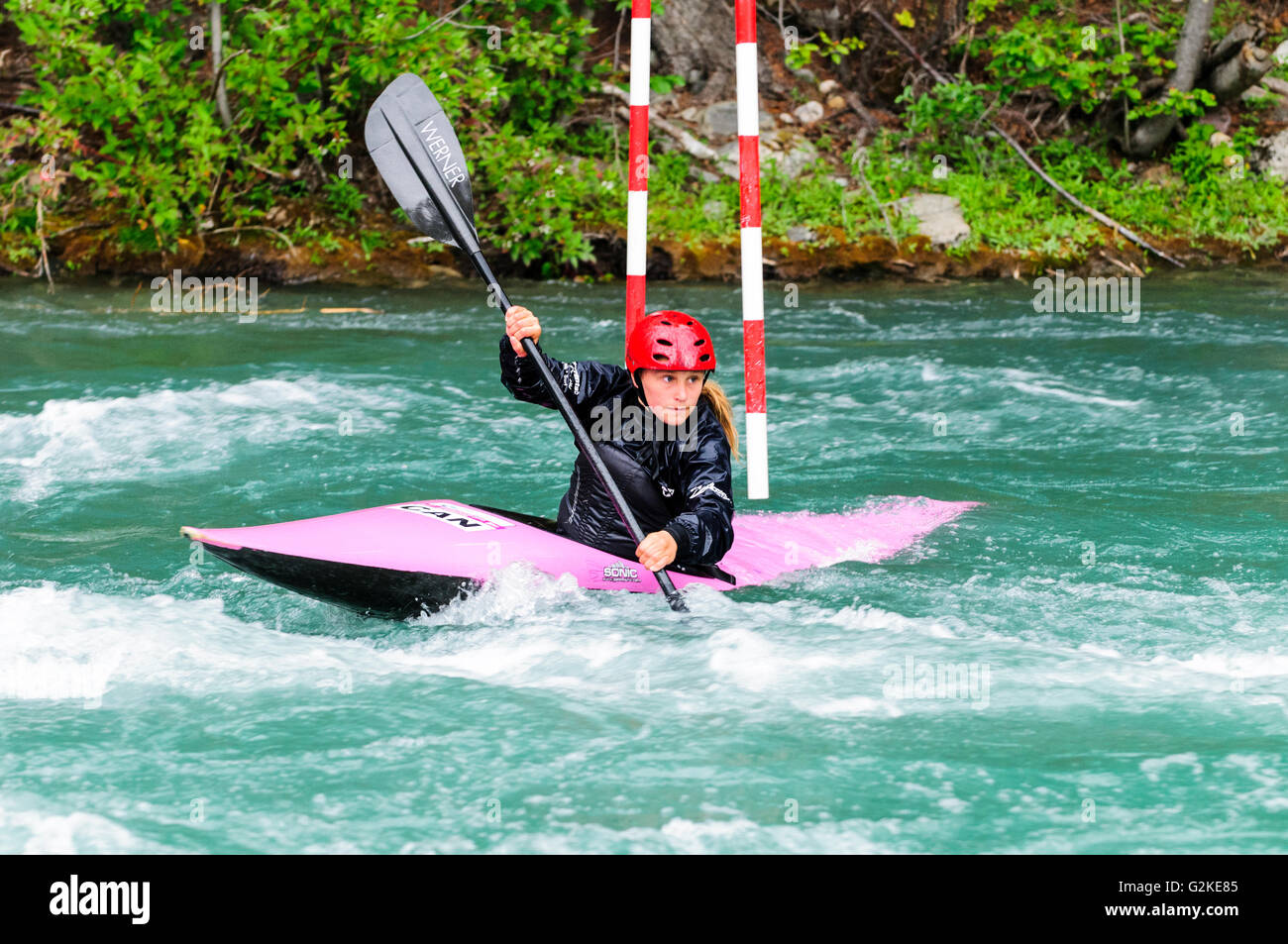 A slalom kayaker navigates the gates at the Canoe Meadows course on the