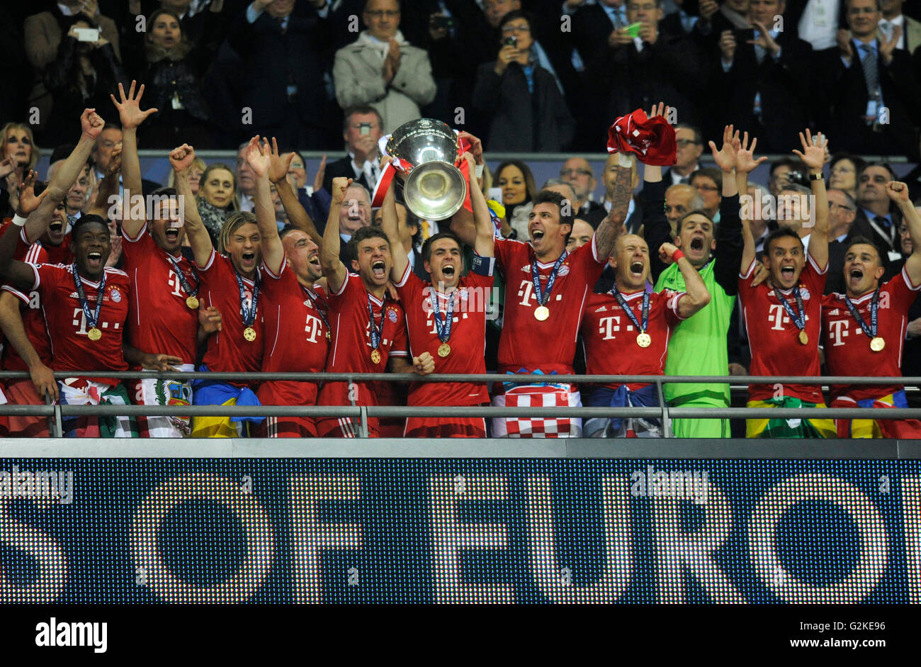 Team of FC Bayern cheering jubilantly with the trophy, UEFA Champions League Final 2013, Borussia Dortmund - FC Bayern Munich Stock Photo