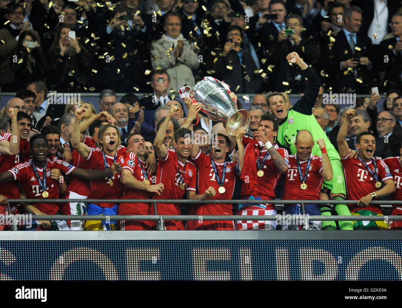 Team of FC Bayern cheering jubilantly with the trophy, UEFA Champions League Final 2013, Borussia Dortmund - FC Bayern Munich Stock Photo