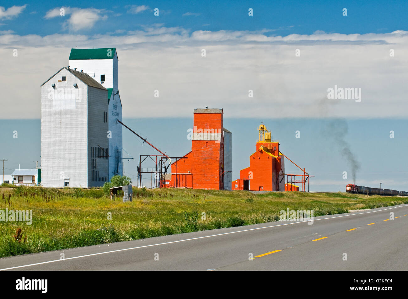 train and grain elevators Cabri Saskatchewan Canada Stock Photo