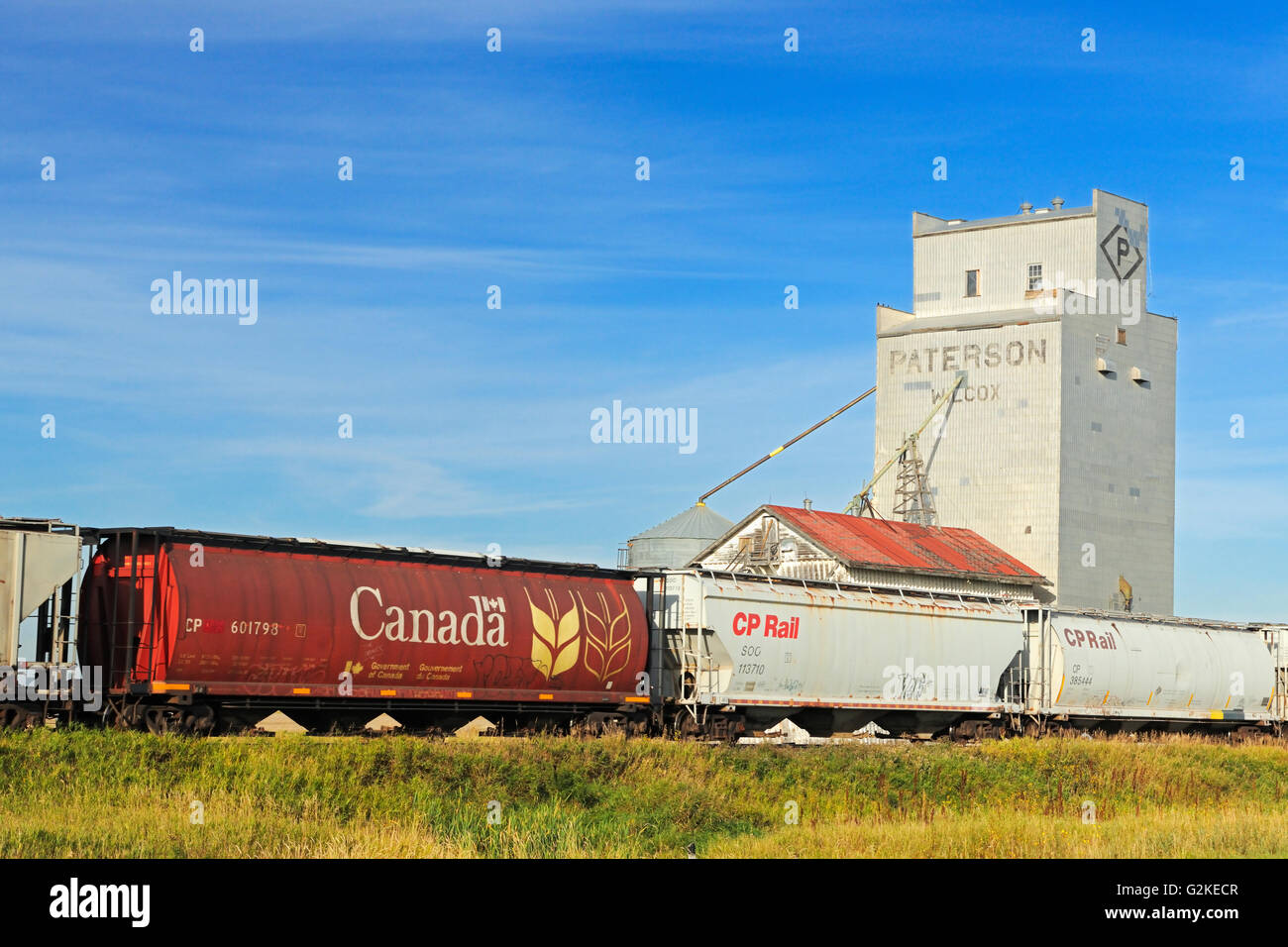 Grain elevator and train Wilcox Saskatchewan Canada Stock Photo