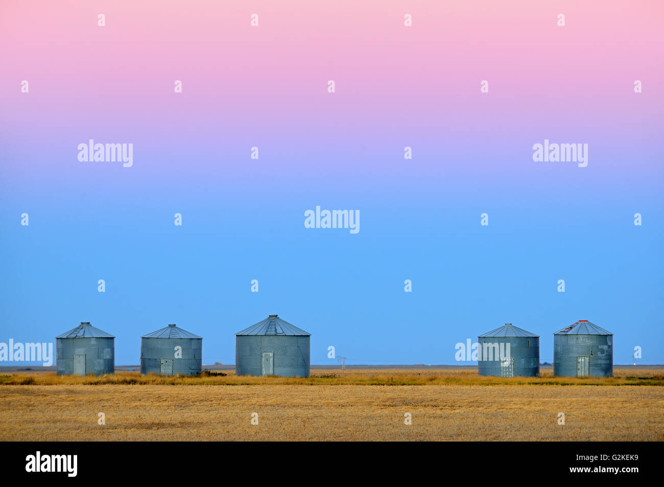 Grain bins at dawn Moose Jaw Saskatchewan Canada Stock Photo