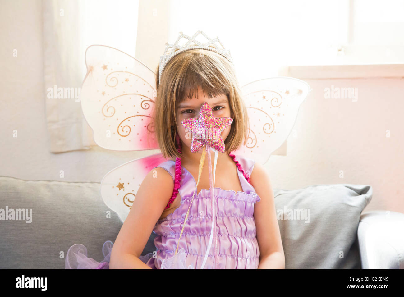 Portrait of little girl dressed up as fairy queen Stock Photo Alamy