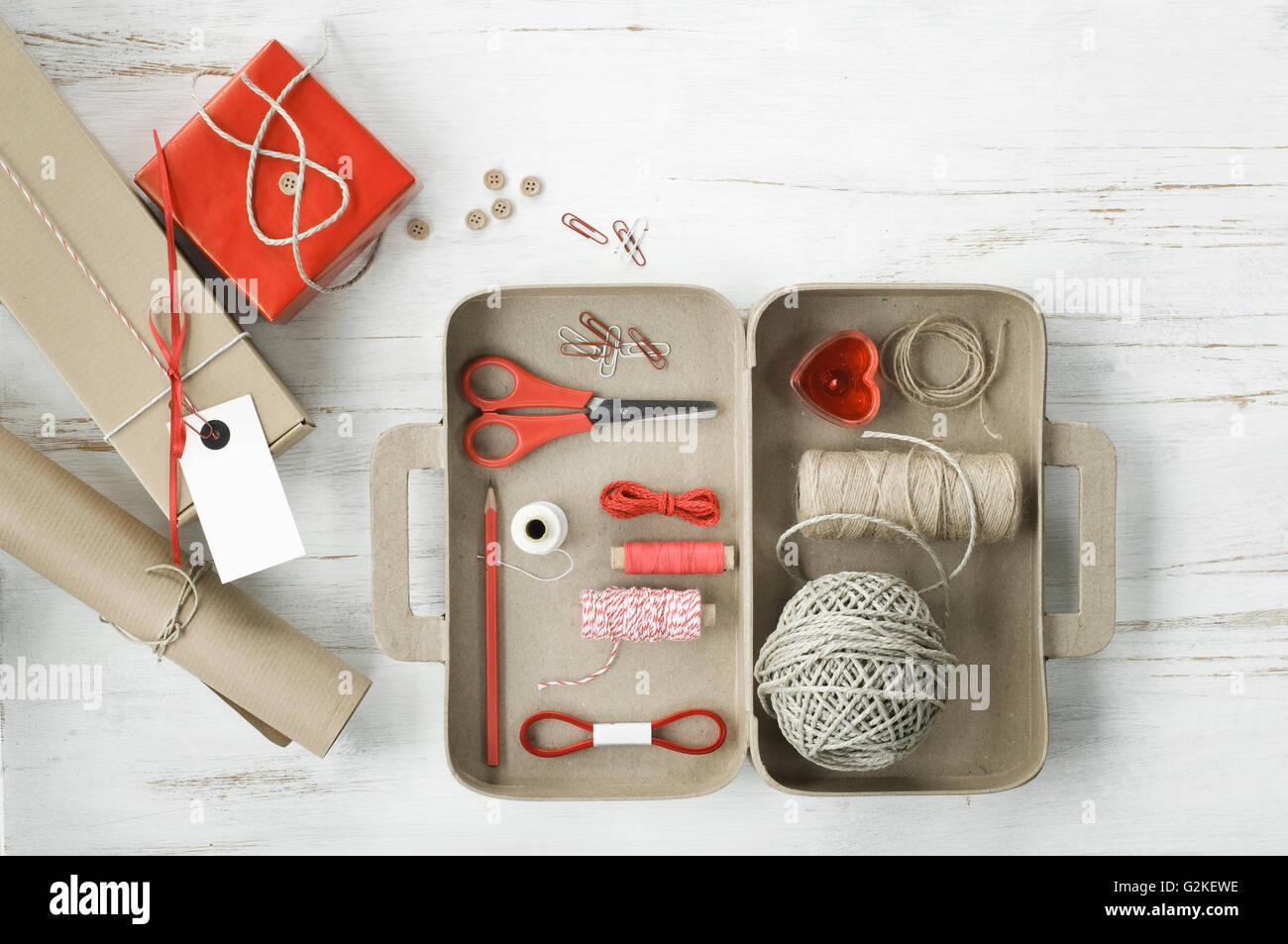 Tinkering utensils in a cardboard box shaped like a case Stock Photo