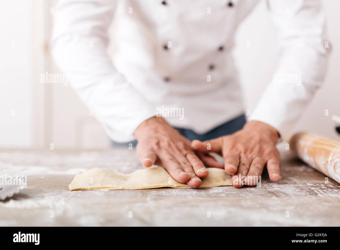 Chef shaping fresh ravioli Stock Photo - Alamy