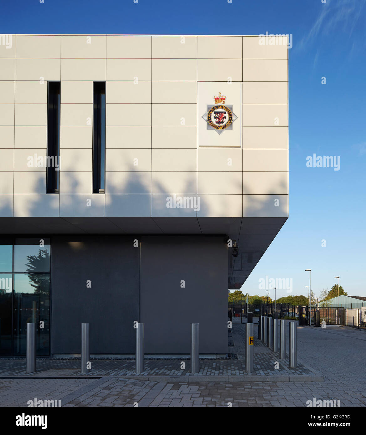Detail of exterior cladding with emblem and signage. Keynsham Custody Suite and Prosecution and Investigation Facility, Keynsham, United Kingdom. Architect: Haverstock Associates LLP, 2014. Stock Photo