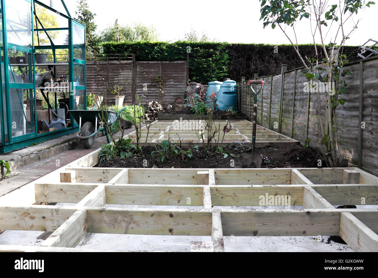 TIMBER GARDEN DECK UNDER CONSTRUCTION. UK Stock Photo Alamy
