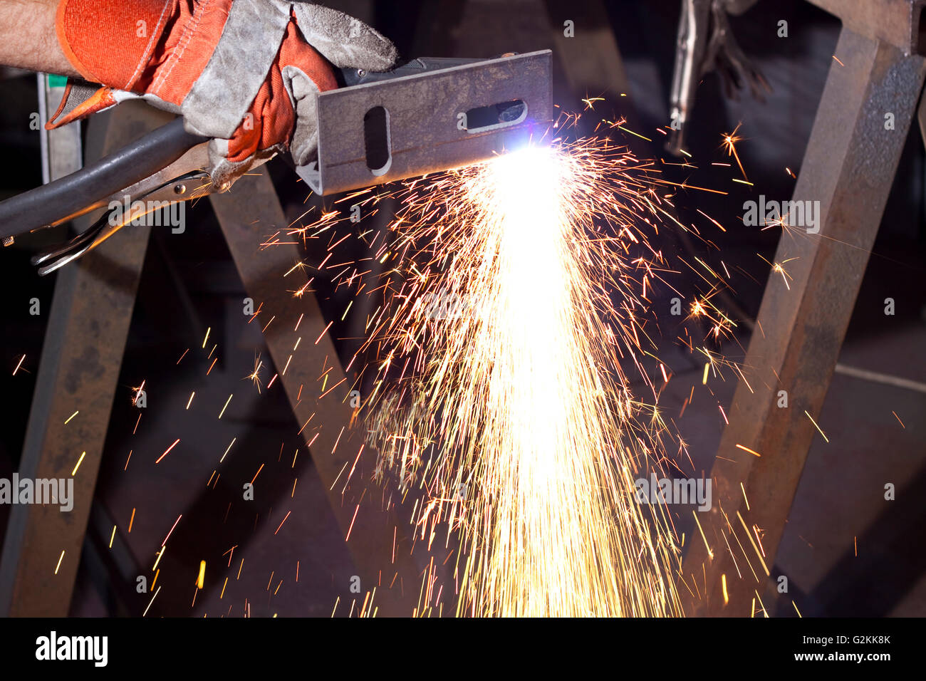 sparks made while plasma cutting steel plate Stock Photo - Alamy