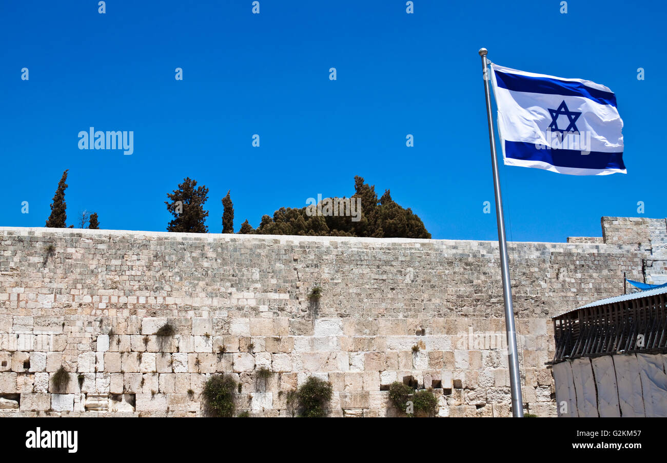 israelian flag and the western wall last standing wall of the second temple Stock Photo